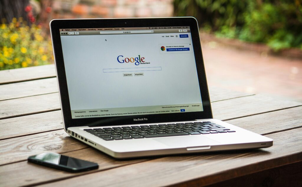 Image of a Laptop with Google search on Screen for the article Domain Name Seo Checker: For the Perfect Domain Name.